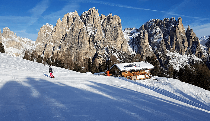Skigebied Val di Fassa: Mooie, uitstekend geprepareerde pistes in de prachtige Dolomieten en lekker genieten van de Italiaanse keuken © SkigebiedenGids.nl